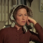 Caroline stares at Mrs. Oleson in "Little House"