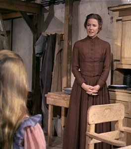Ma Ingalls talks with Mary in their Little House on the Prairie