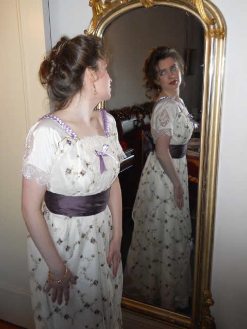 lady-looking-in-a-victorian-mirror-with-edwardian-dress